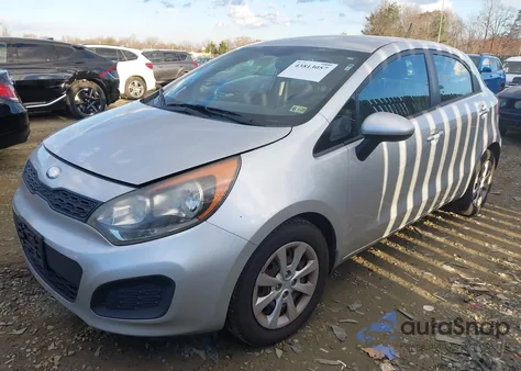 2013 Kia Rio Lx z USA, uszkodzony, nr VIN KNADM5A37D6237094